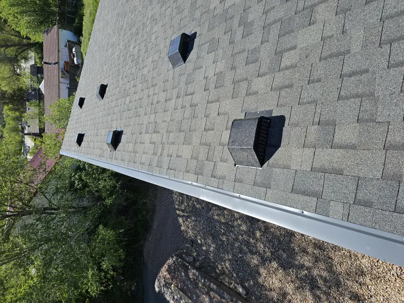New residential shingle roof with ridge vents
